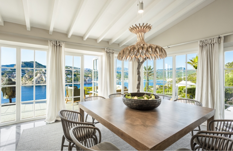 Dining room at a Balearic Island Villa with Glasfront