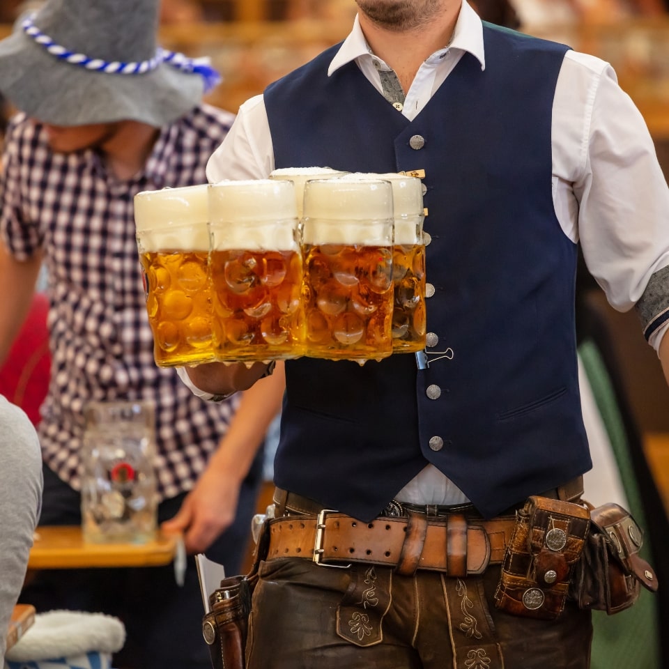 Waiter serving beer at the Okotberfest in Munich
